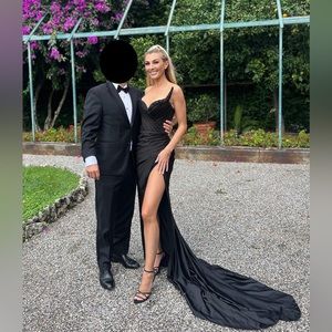 Albina Dyla black gown dress with train